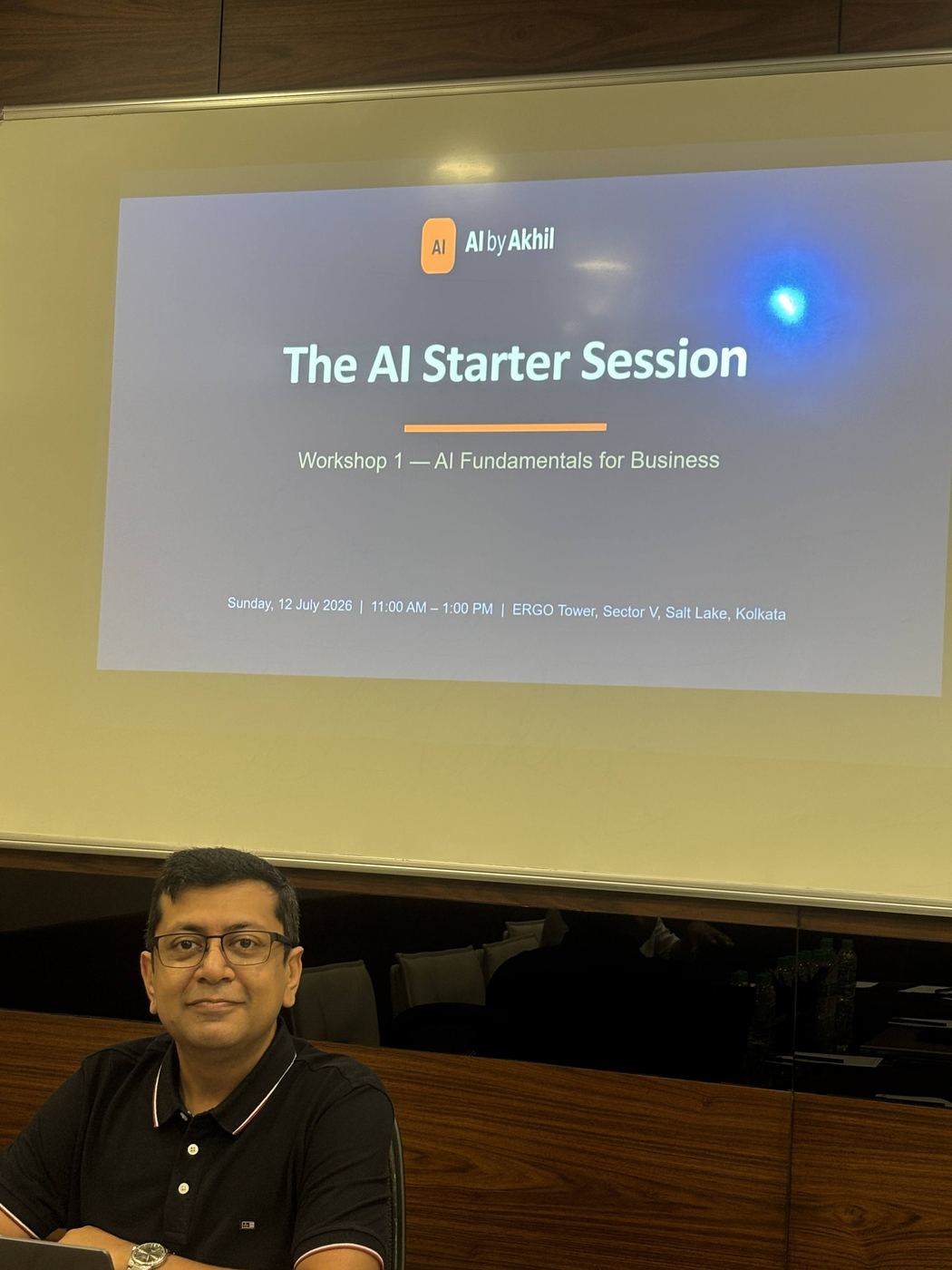 Akhil in front of the AI Starter Session opening slide